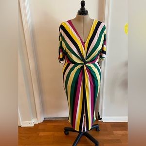 Stand out in this Eloquii striped twist front dress!